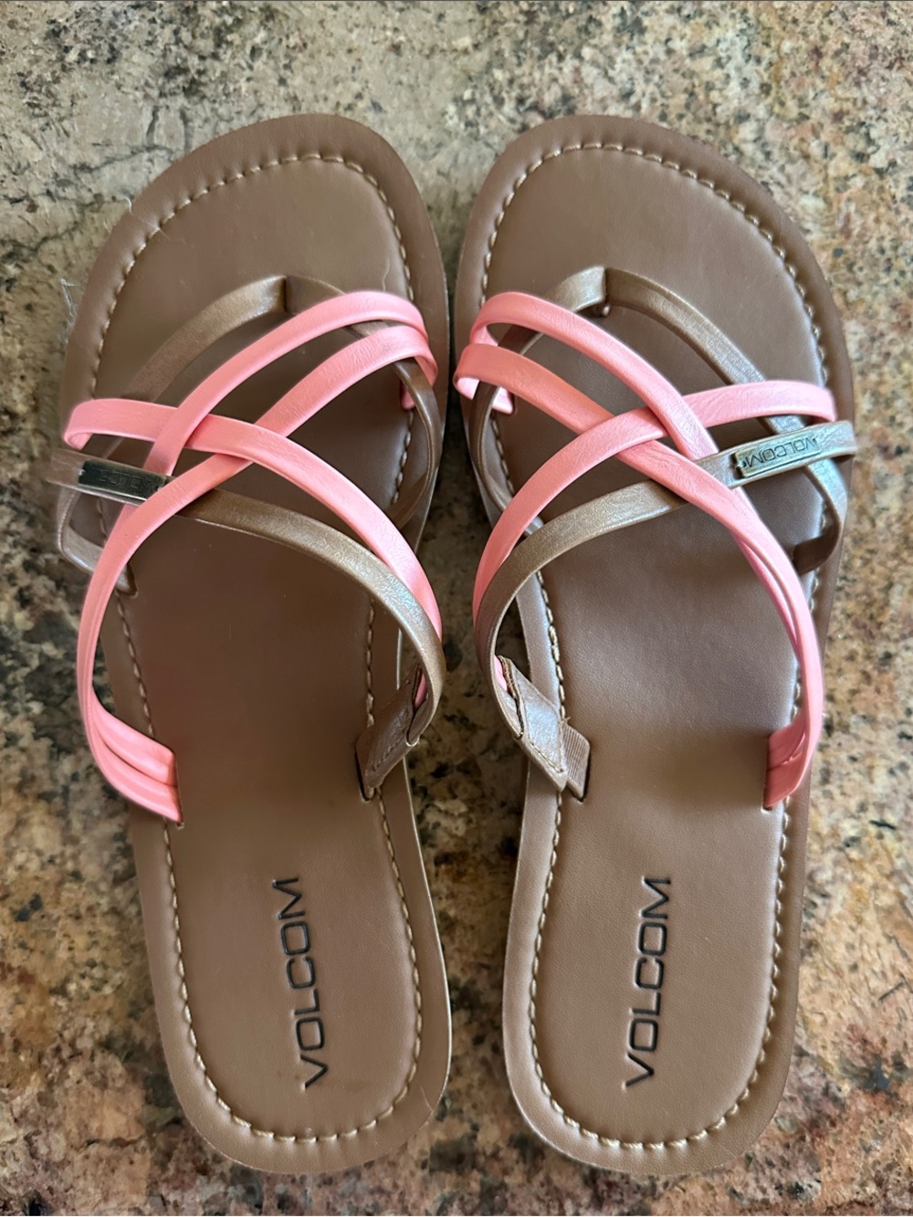 Adorable brown and coral Volcom sandals with crisscross straps
